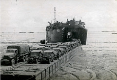 Tarakan, LST 993 unloading on a pontoon causeway, 1945