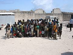 Children queue for food aid in Mogadishu, Somalia, August 2011
