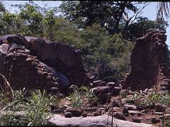Remains of a stone-walled house at the deserted hilltop defensive site of Yagala, Sierra Leone (West Africa)