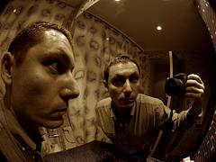 Fisheye portrait in a hotel bathroom Fisheye portrait in a hotel bathroom
