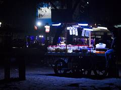 A vendor selling water bottles in Kozhikode beach in Kerala, India