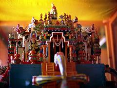 Details of Tibetan Buddhist Hevajra or Kalachakra Deity Palace on double vajras, Buddhas, decor, zephrs, vases, encased in glass, Tibetan Works and Archives Library, 1993 pilgrimage, Dharamsala, India
