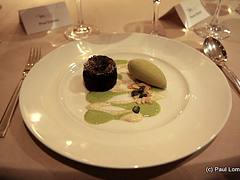 Hot "Guanaja" chocolate fondant with amaretto cream, pistachio ice cream