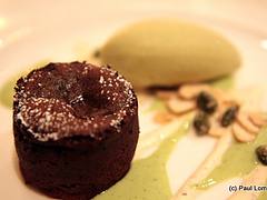 Hot "Guanaja" chocolate fondant with amaretto cream, pistachio ice cream
